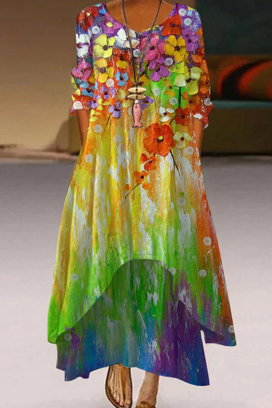 Dámské šaty s kulatým výstřihem a nepravidelným dlouhým rukávem s květinovým potiskem